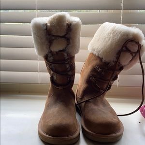 Never worn lace up brown Ugg’s